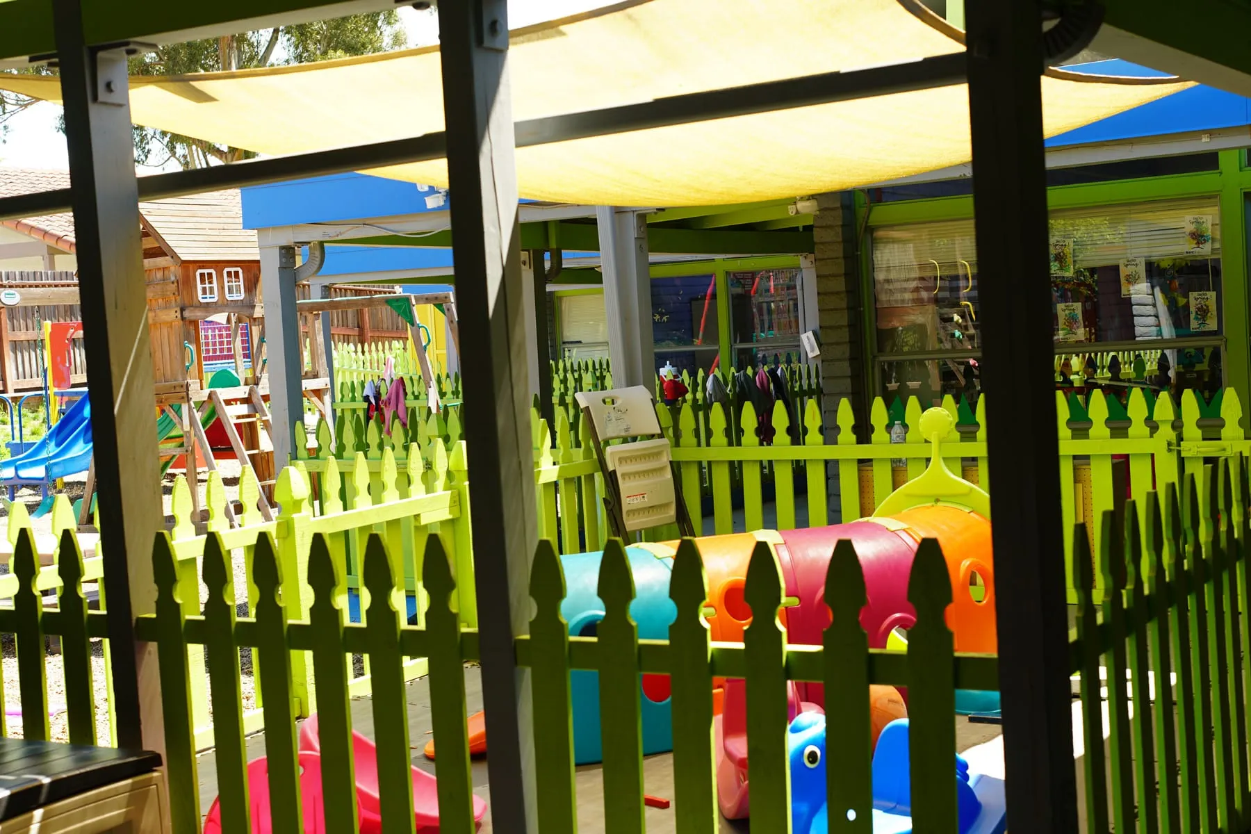 Infant exploring sensory materials in a nurturing childcare environment in Pleasanton