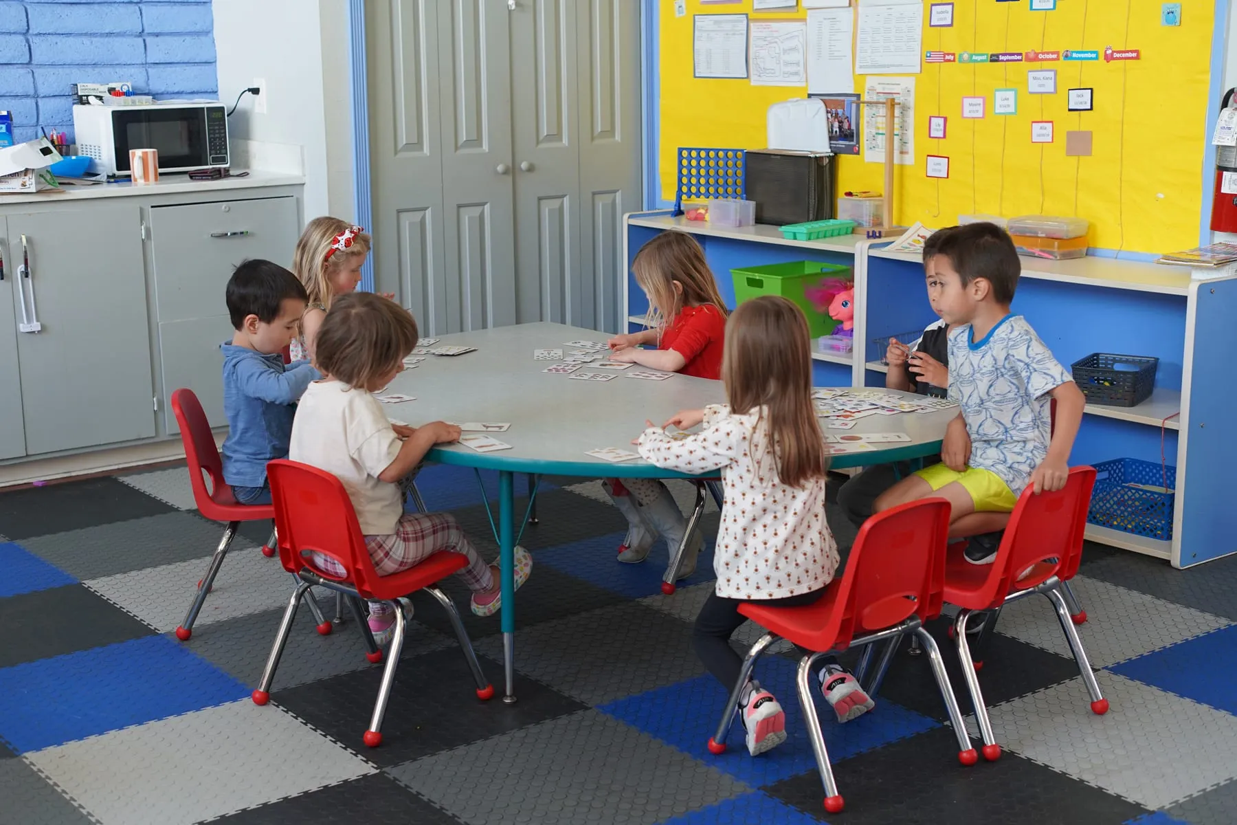 Toddlers engaging in interactive sensory play and early social learning at Creative Learners Pleasanton